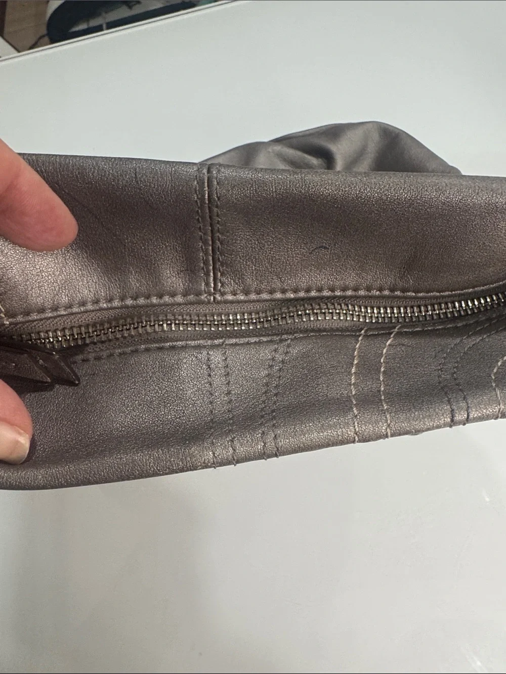 Coach Y2K Madison hobo bag featuring metallic pewter leather and silver studded